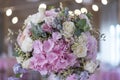 Wedding bouquet of pink and lilac peonies and roses.