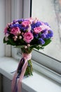 Wedding bouquet in pink and purple tones. Beautiful and delicate.General view