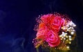 Wedding bouquet of red roses and white flowers on a blue space background Royalty Free Stock Photo