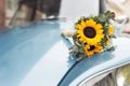 Wedding bouquet in a retro car Royalty Free Stock Photo