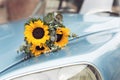 Wedding bouquet and a retro car Royalty Free Stock Photo