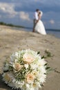 Wedding bouquet of roses on the beach Royalty Free Stock Photo