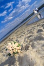 Wedding bouquet of roses on the beach Royalty Free Stock Photo