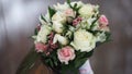 Wedding bouquet of roses. Bride`s bouquet on wedding day. Bouquet of different flowers. Bouquet of beautiful pink and Royalty Free Stock Photo