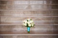 Wedding bouquet of roses on a granite steps Royalty Free Stock Photo