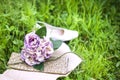 Wedding bouquet and shoes Royalty Free Stock Photo