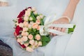 Wedding bouquet on wedding dress Royalty Free Stock Photo