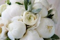 Wedding bouquet of white peonies and ranunculuses. Wedding floristry Royalty Free Stock Photo