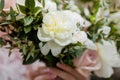 Wedding bouquet of white peony and coffee roses. Lots of greener Royalty Free Stock Photo