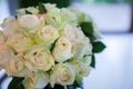 Wedding bouquet of white roses in the bride room