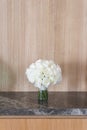 Wedding bouquet, wooden wall background, cristal vase