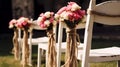 Wedding bows of rope pink bouquets on chairs. Generative ai design Royalty Free Stock Photo