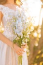 Wedding bridal bouquet of blue Delphinium in the hands of the br Royalty Free Stock Photo