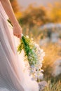 Wedding bridal bouquet of blue Delphinium in the hands of the br Royalty Free Stock Photo