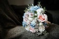 Wedding bridal bouquet with white, roses, daisies and red berries Royalty Free Stock Photo