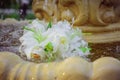 The Wedding Bridal Bouquet Of White Roses Lies In An Old Fountain Under Splashes And Drops Of Water. Royalty Free Stock Photo