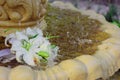 The Wedding Bridal Bouquet Of White Roses Lies In An Old Fountain Under Splashes And Drops Of Water. Royalty Free Stock Photo