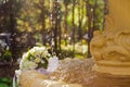 The Wedding Bridal Bouquet Of White Roses Lies In An Old Fountain Under Splashes And Drops Of Water. Royalty Free Stock Photo