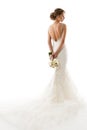 Wedding Bride Back Rear View, Beautiful Woman in White Sexy Dress with Long Tail Train and Flowers Bouquet, Elegant Studio Royalty Free Stock Photo