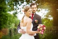 Wedding bride and groom in a meadow Royalty Free Stock Photo