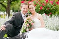 Wedding - bride and groom in a park Royalty Free Stock Photo