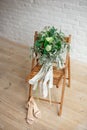 Wedding bride`s wedding accessories. Flower ,shoes and chair. Royalty Free Stock Photo