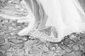 Wedding bride taking a walkk berefoot Royalty Free Stock Photo