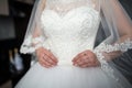 Wedding, the bride wore a white dress and now she is laced with a corset Royalty Free Stock Photo