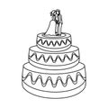 Wedding cake with bride and groom dummies in black and white Royalty Free Stock Photo
