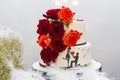 Wedding cake on the bride`s desk Royalty Free Stock Photo