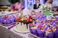 Wedding cake with a candy bar at a banquet