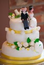 Wedding cake with gold ribbon