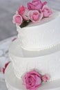 Wedding cake with pink roses Royalty Free Stock Photo