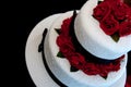 Wedding Cake with red roses Royalty Free Stock Photo