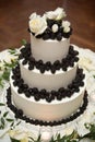 Wedding cake with rose and barries Royalty Free Stock Photo
