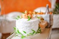 Wedding cake on the table in the room with a beautiful interior Royalty Free Stock Photo