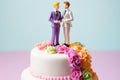 Wedding cake topper with two grooms, figurines of a gay couple. Gay marriage concept. Same-sex gay marriage, wedding sweets and