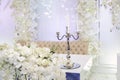 Wedding candle holder with floral decoration at the wedding banquet