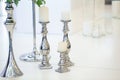 Wedding candle holder with floral decoration at the wedding banquet