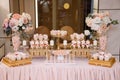 Wedding candy bar, table with sweets decoration with delicious cakes and dessert Royalty Free Stock Photo