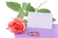 Wedding card and rose with wedding rings Royalty Free Stock Photo