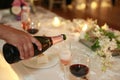 Wedding celebration. Pouring shampagne in glasses Royalty Free Stock Photo