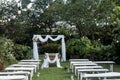 Wedding ceremony arch, altar decorated with flowers on the lawn Royalty Free Stock Photo