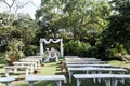 Wedding ceremony arch, altar decorated with flowers on the lawn Royalty Free Stock Photo