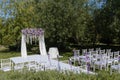 Wedding ceremony arch in white, violet, blue, pink colors Royalty Free Stock Photo