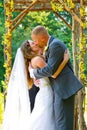 Wedding Ceremony Bride and Groom Kiss Royalty Free Stock Photo