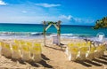 Wedding ceremony chairs and decorations on the beach shore Royalty Free Stock Photo