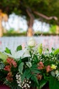 Wedding ceremony decoration with rose and lilies.