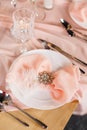 Wedding ceremony decoration. Decoration of wedding table with tender pink textile. Royalty Free Stock Photo