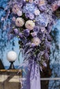 Wedding ceremony decorations: close-up decor of arch, decorated with crysanthemums, roses, hydrangeas and greenery. A Royalty Free Stock Photo